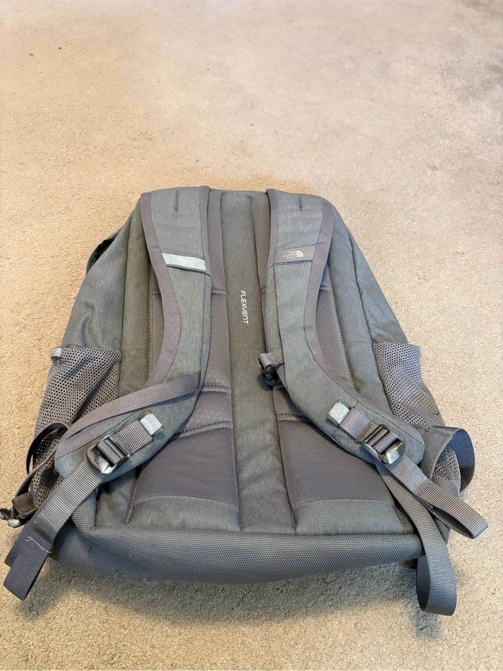 The North Face Gray Women’s Backpack with Light Blue Bungee